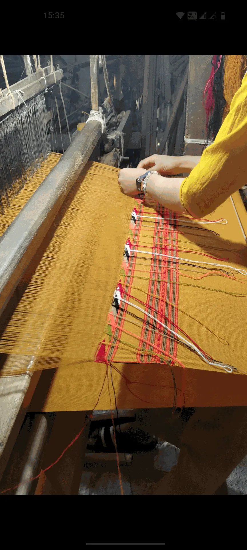 Himachali shawl being woven on wooden handloom by artisans