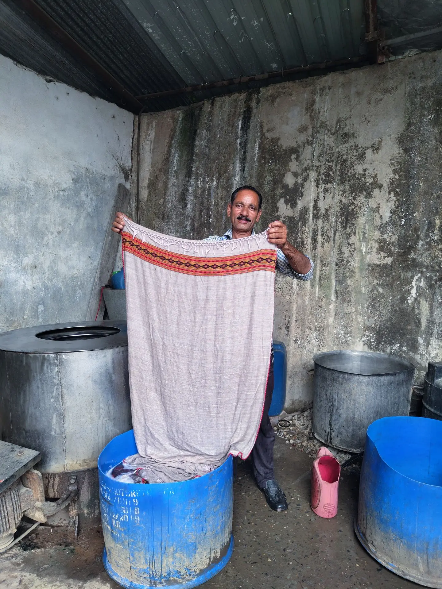 Washed Himachali shawl being dried and ironed for final finish